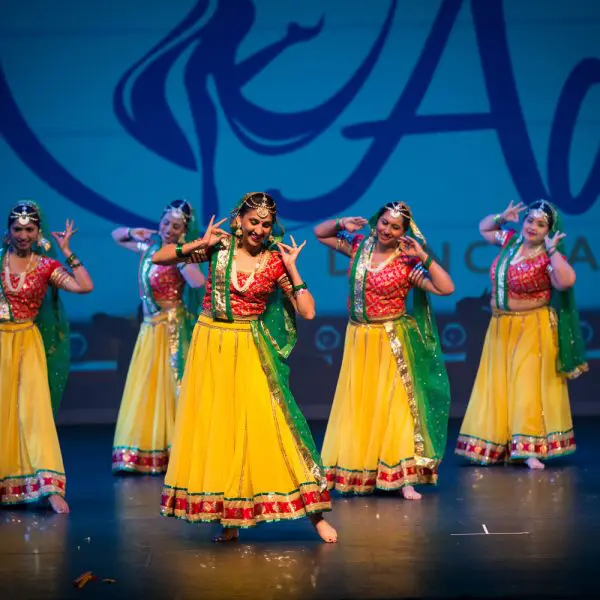 Adaa Dancers in Red and Yellow with Green Accent